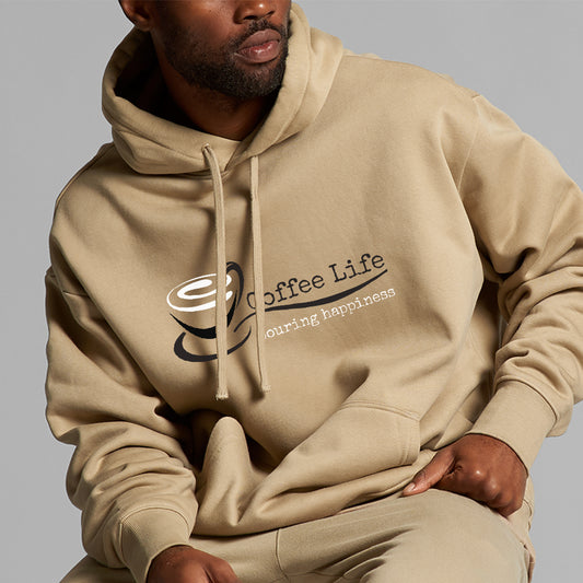 Person wearing a beige hoodie with 'Coffee Life' text and logo on a gray background